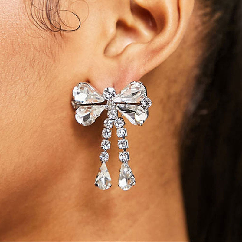 Cute Plated Rhinestone Embellished Bow Motif Drop Earrings - Silver